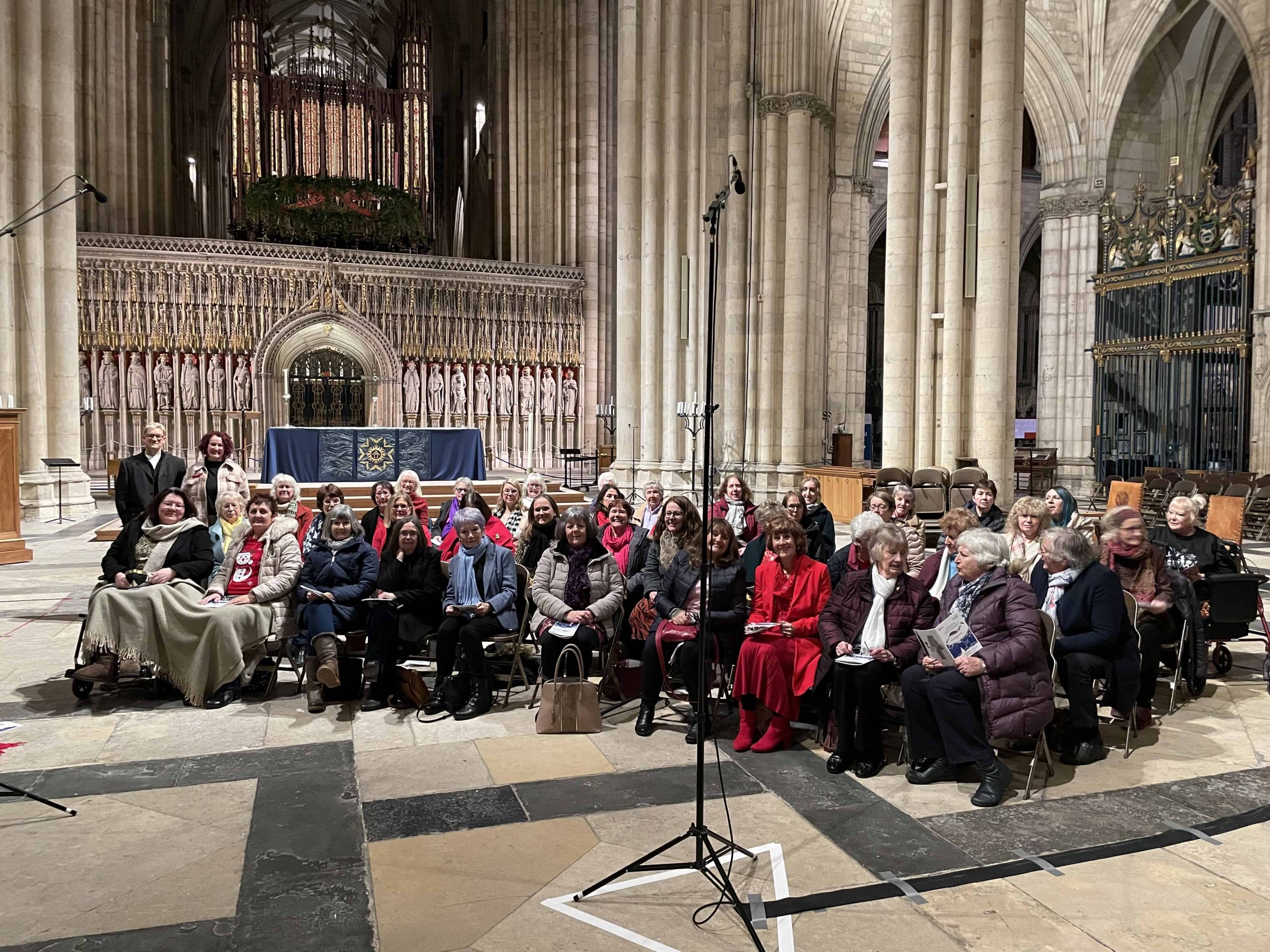 Wellbeing Choir in the minster ready to perform